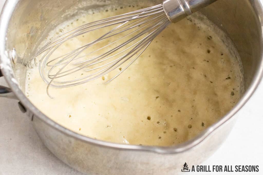 thickened béchamel sauce in pot