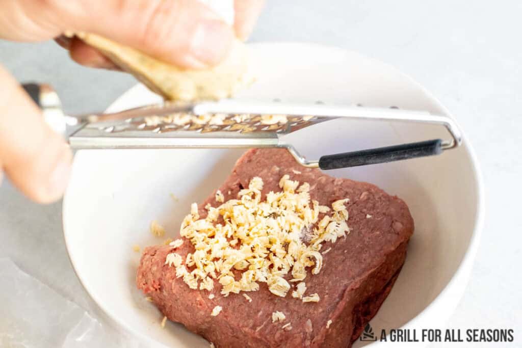 hand grated frozen butter into bowl