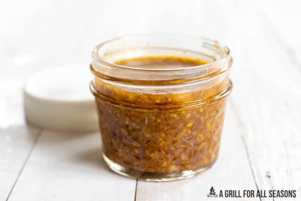 honey mustard marinade in small mason jar