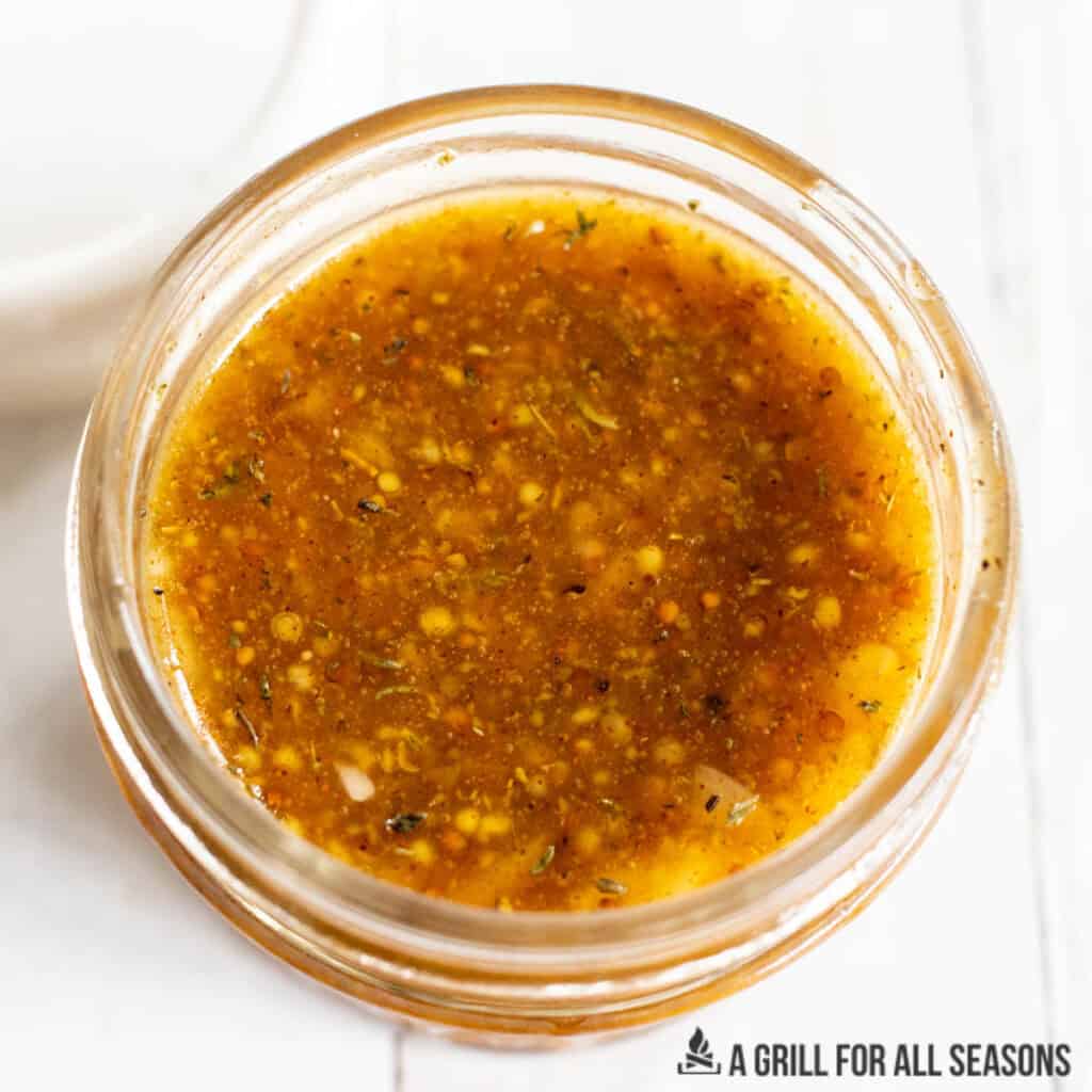 honey mustard marinade in small jar from overhead
