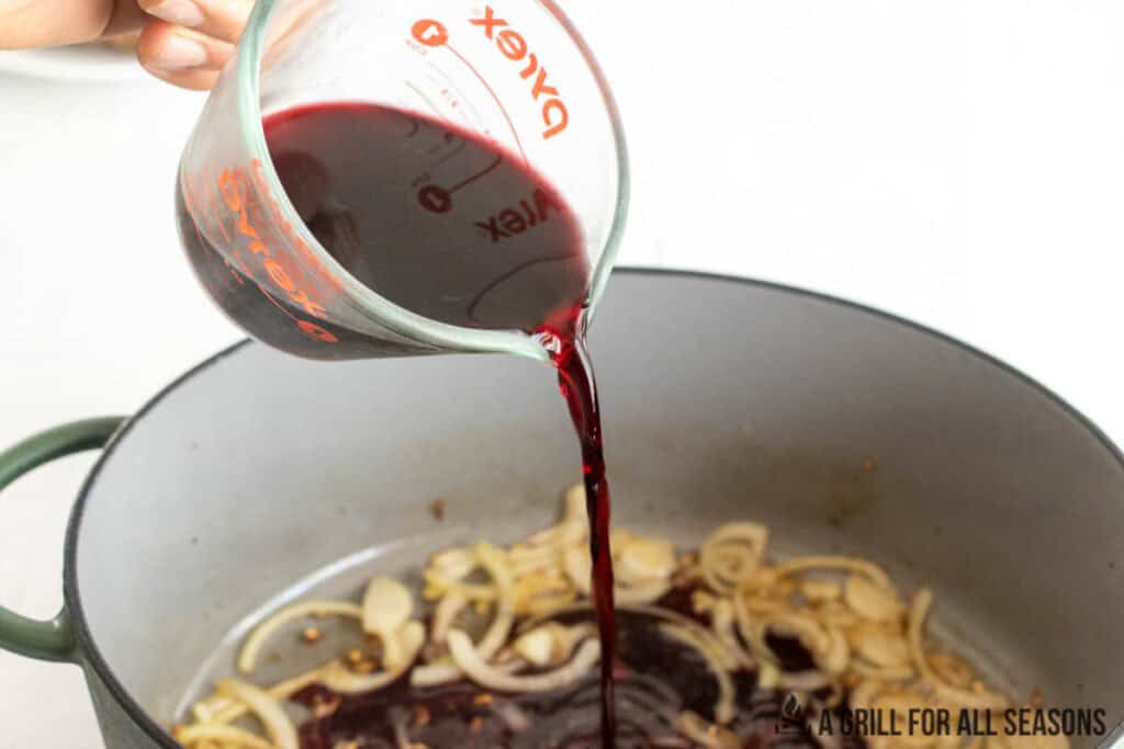 wine being poured into pot