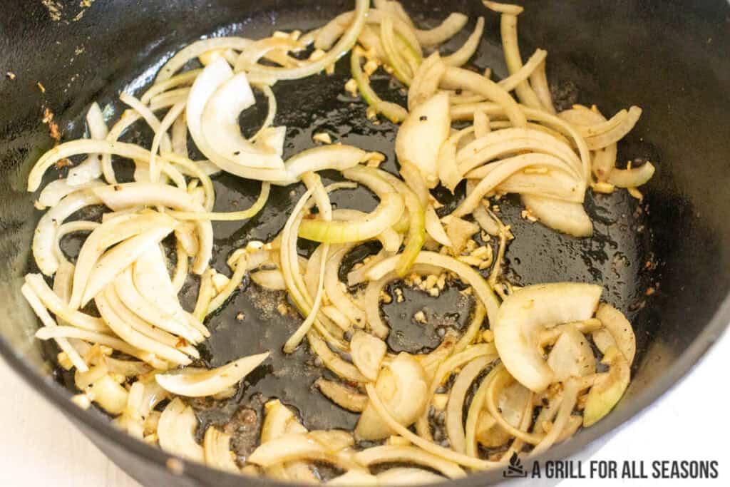 onions and garlic cooking in pot