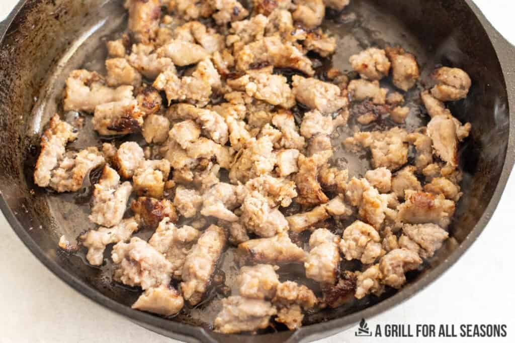 browned sausage in pan