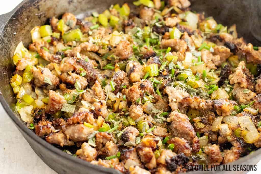 herbs and seasoning added to pan