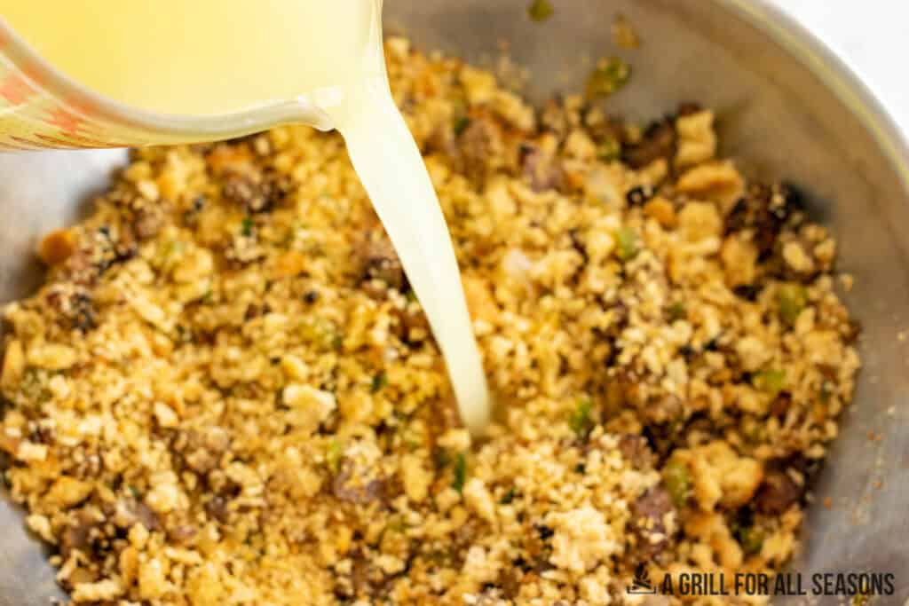chicken broth being added